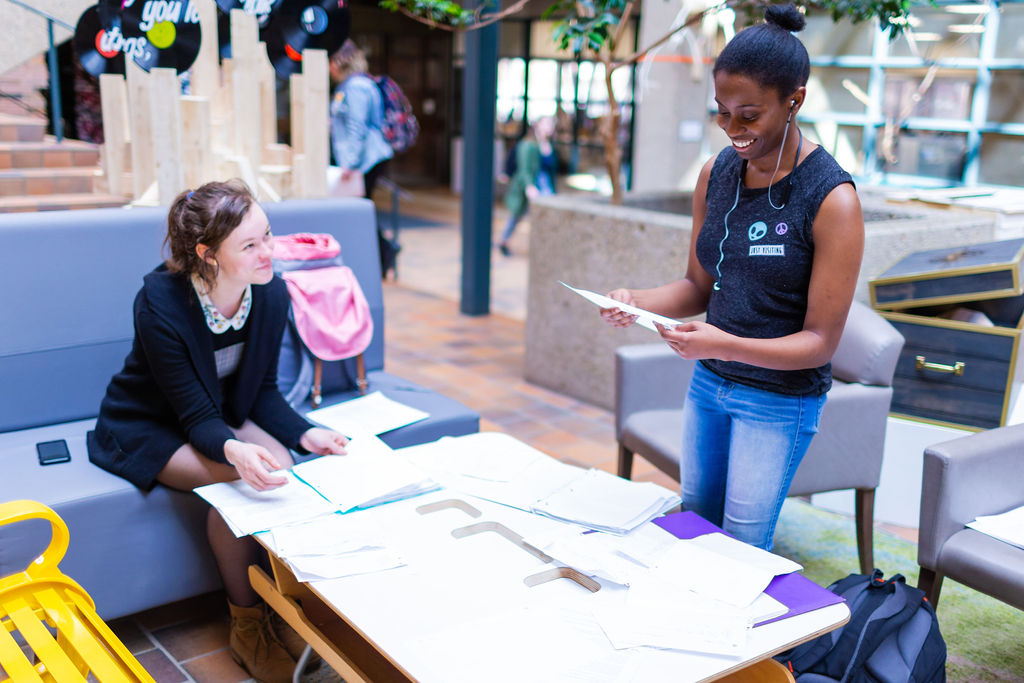 Two students working on a project together in Rutherford Galleria