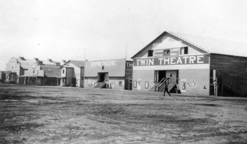 Exterior shot of a row of five buildings.