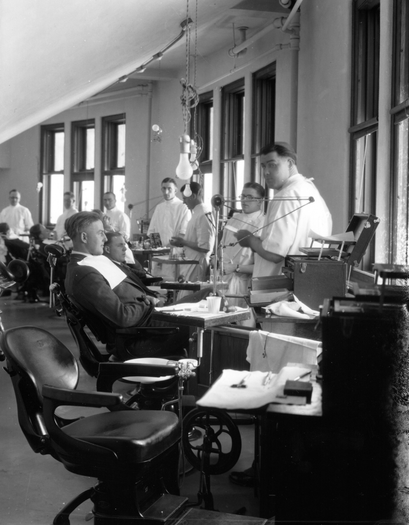 Dentistry students at the University of Alberta attending to patients in 1927.

https://archive.org/details/uaa-1969-097-628b